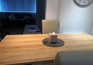 a box of tissues sitting on top of a wooden table at Chalet 147 South Shore Bridlington in Bessingby