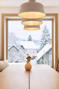 En eller flere senge i et værelse på Da Alois - Alpine Premium Apartments
