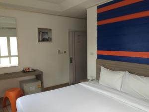 Postel nebo postele na pokoji v ubytování For You Residence
