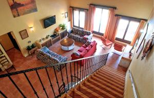 an overhead view of a living room with couches at Casa Rural Montion in Jimera de Líbar