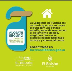 a flyer for a appliance septic company with a house at Casa Terra Monoambiente in El Bolsón