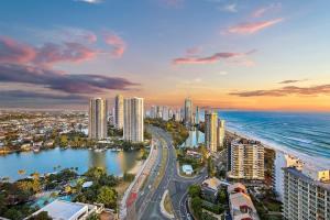 an aerial view of a city and the ocean at Golden Arcade - Views Games Vibes in Gold Coast