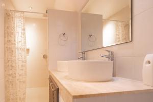 a white bathroom with a sink and a shower at JUNGLE APARTMENT2 BEDROOMS PRIVATE POOl in Kamala Beach +28 photos