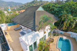 an aerial view of a house with a swimming pool at JUNGLE APARTMENT2 BEDROOMS PRIVATE POOl in Kamala Beach