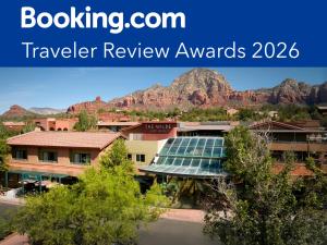 a review of travel review awards with mountains in the background at The Wilde Resort and Spa in Sedona