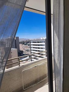 a view from the balcony of a building at Agradable Dpto Calama Centro in Calama