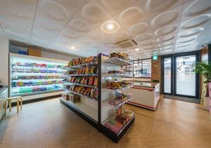 a grocery store aisle with a shelf of food at Incheon Juan Chungchoon Hotel in Incheon