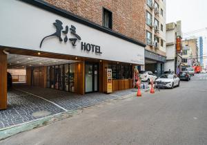 a hotel on the side of a city street at Incheon Juan Chungchoon Hotel in Incheon