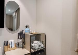 a bathroom with a sink and a mirror at Incheon Juan Chungchoon Hotel in Incheon +72 photos