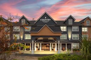 a rendering of the exterior of a building at Country Inn & Suites by Radisson, Jacksonville - Orange Park in Orange Park