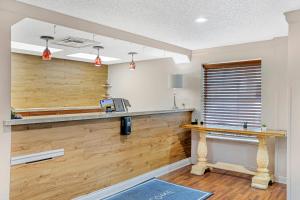 a cashier counter in a dental office at Country Inn & Suites by Radisson, Jacksonville - Orange Park in Orange Park