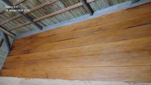 a wooden ceiling in a room with at Homestay Yenkop in Poelau Mansoear