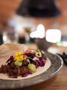 a plate of food on top of a table at Nova Galaxy Village in Rovaniemi