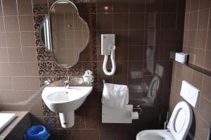 Koupelna v ubytování Aerhotel Phelipe