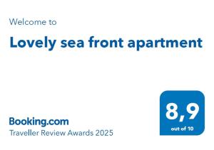 a sign that reads loyalty sea front appointment at Lovely sea front apartment in Itea +1 photo