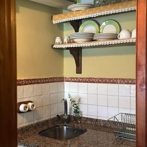 Kuchyň nebo kuchyňský kout v ubytování Casa Rural Jim Morrison