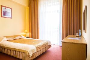 Ein Bett oder Betten in einem Zimmer der Unterkunft Hotel Accademia