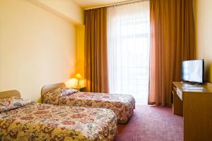 Ein Bett oder Betten in einem Zimmer der Unterkunft Hotel Accademia