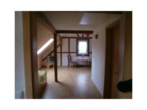 a view of a living room with a dining room at Ferienhaus Krabiell in Saalfeld