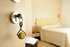 Posteľ alebo postele v izbe v ubytovaní Honey Rooms