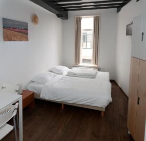 Кровать или кровати в номере City Hostel Vlissingen