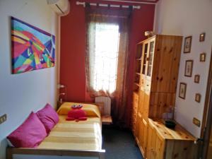A bed or beds in a room at Le Magnolie B&B