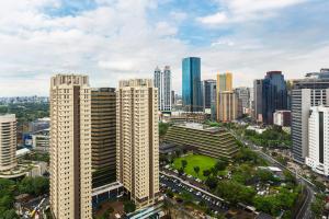 an aerial view of a city with tall buildings at Richmonde Hotel Ortigas, Manila in Manila