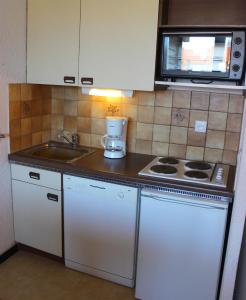 Kuchyň nebo kuchyňský kout v ubytování Eterlous Appartements VTI