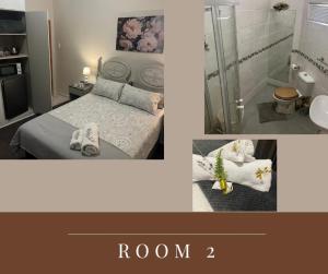a bedroom with a bed and a shower and a bathroom at Bowden Guesthouse in Lime Acres