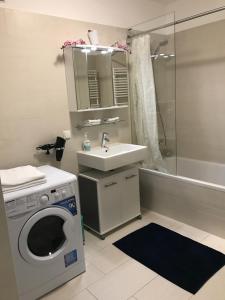 A bathroom at Apartment with parking on premise Még 37 kép