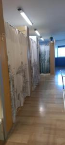 a hallway with drawings on the walls of a building at I Love Host 24 in Montefiascone