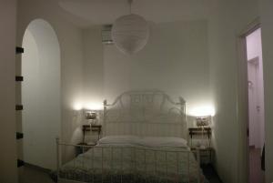Postel nebo postele na pokoji v ubytování B&B Casa Cantoniera