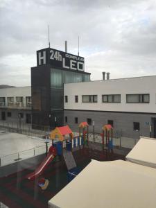 a playground on the roof of a building at Complejo Leo 24H in Monesterio