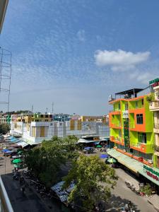 an overhead view of a city street with buildings at Nhà nghỉ Thu Hoạch in Hà Tiên +26 photos