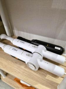 a group of wii controllers sitting on a shelf at Bom Stay in Seoul