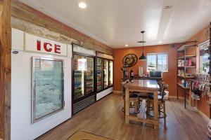 a dining room with a table in a store at Sun Outdoors Arches Gateway in Moab