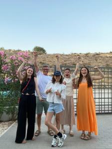 a group of people standing in front of a fence at Bed & Breakfast Esprit de Mer in De Panne