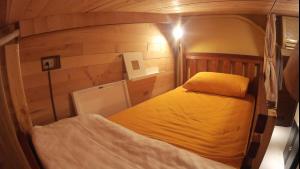 Postel nebo postele na pokoji v ubytování On Board Hostel