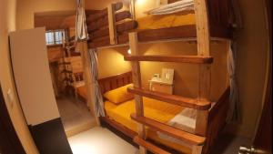 Postel nebo postele na pokoji v ubytování On Board Hostel