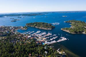 an aerial view of a harbor with boats in the water at KSSS Vandrarhem Telegrafholmen in Sandhamn +4 photos