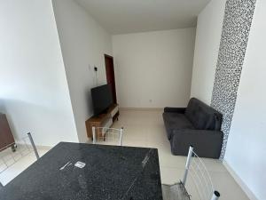 a living room with a couch and a table at Casa Terra in Prado