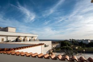 a view of the ocean from the roof of a building at Hotel Sirio in Lampedusa