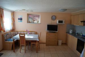 Kuchyň nebo kuchyňský kout v ubytování Apartment Robert