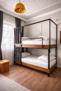 a bedroom with two bunk beds in a room at Gold Coast Hostel in Antalya +37 photos