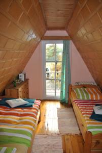Voodi või voodid majutusasutuse Finnhütte Rudolf toas