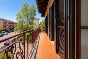 a balcony of a building with a railing at Residenza Santa Rita in Novara