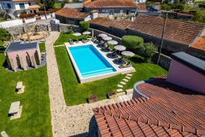 an aerial view of a backyard with a swimming pool at Boutique Hotel Casa da Brêa Viana do Castelo in Viana do Castelo