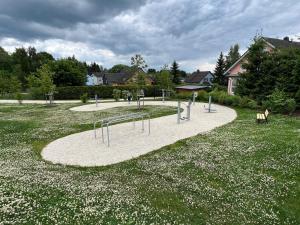 a park with a playground in the middle of a field at Das Fränkische Reichenbach in Reichenbach