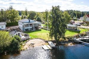 an aerial view of a house on the water at VGO824-Boras-Nabbagatan-38 in Borås