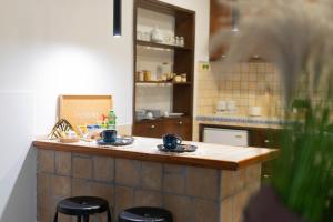 Kuhinja ili čajna kuhinja u objektu Gaming Loft Aversa -Sala Giochi & 10 Ospiti +49 fotografija